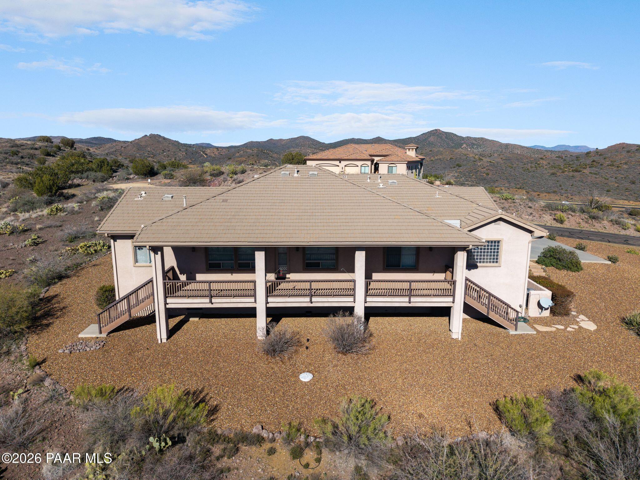 15411 East Rough Rider Ridge Mayer, AZ 86333 - Photo 54 of 57 a view of a terrace with a mountain