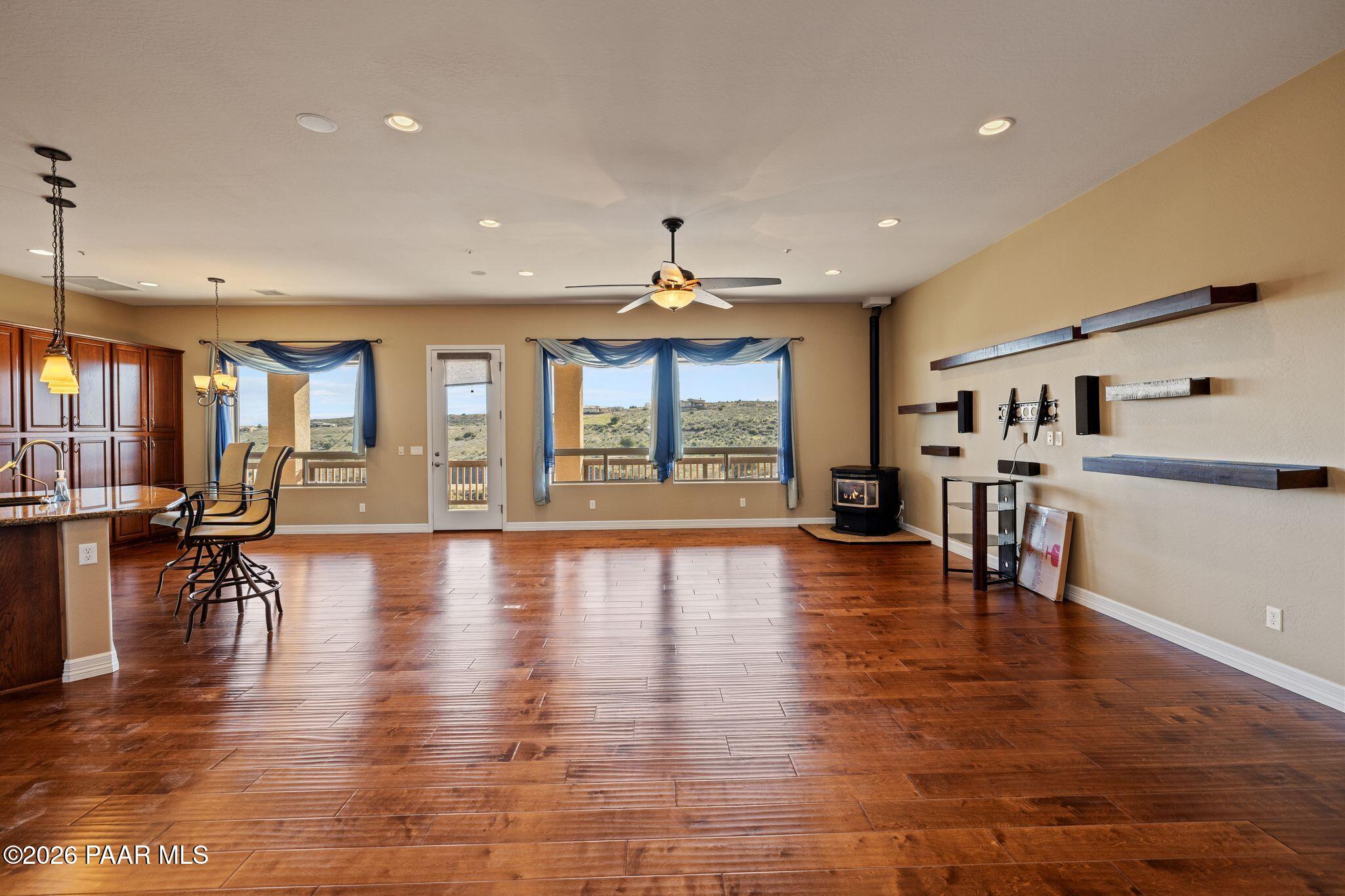 15411 East Rough Rider Ridge Mayer, AZ 86333 - Photo 7 of 57 a view of dining room with furniture and wooden floor