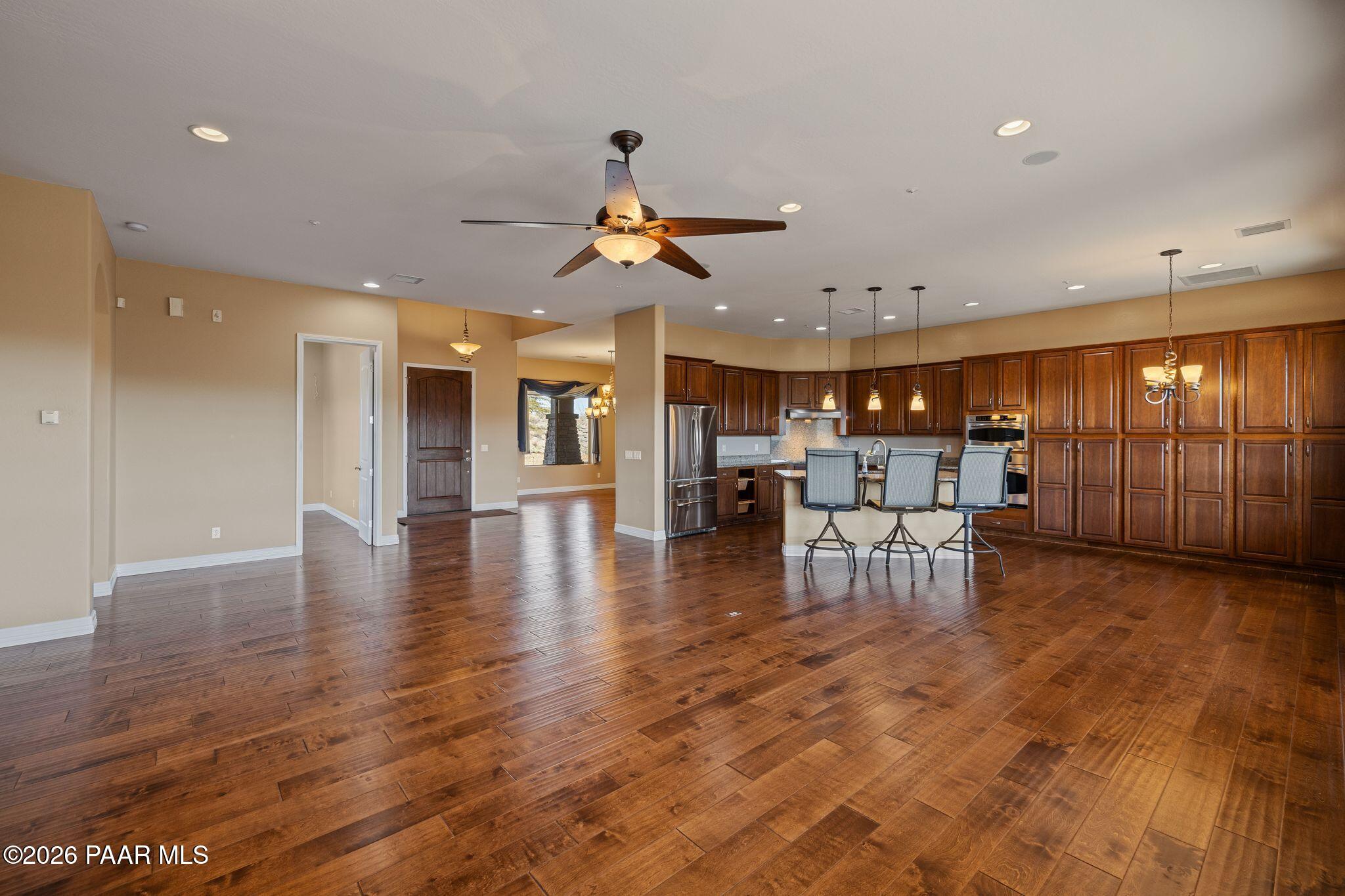 15411 East Rough Rider Ridge Mayer, AZ 86333 - Photo 9 of 57 a view of dining room with furniture and wooden floor