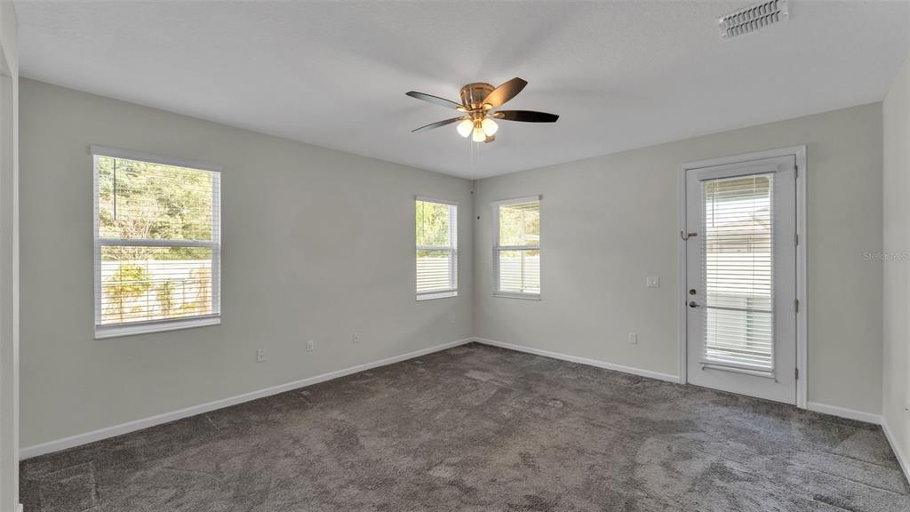 244 Pershing Street Bartow, FL 33830 - Photo 15 of 32 a view of an empty room with a window