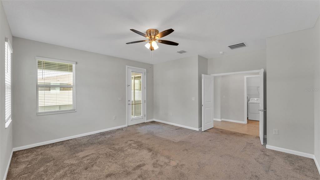 244 Pershing Street Bartow, FL 33830 - Photo 17 of 32 a view of empty room with window and ceiling fan