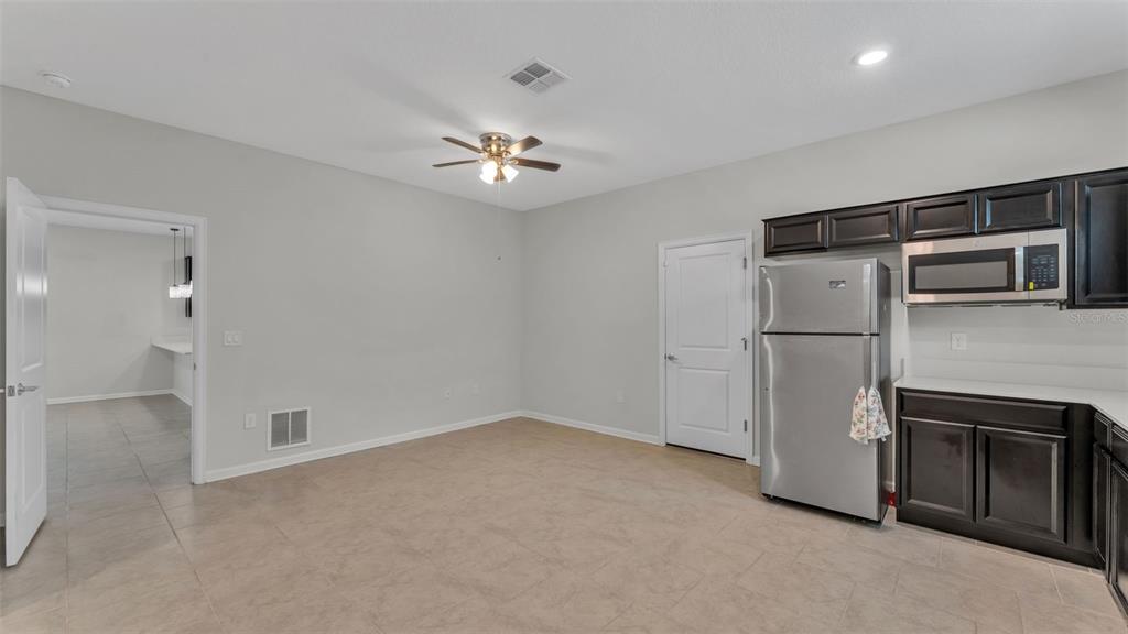 244 Pershing Street Bartow, FL 33830 - Photo 21 of 32 a view of empty room with a kitchen