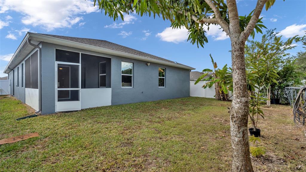 244 Pershing Street Bartow, FL 33830 - Photo 29 of 32 a view of an house with backyard space and garden