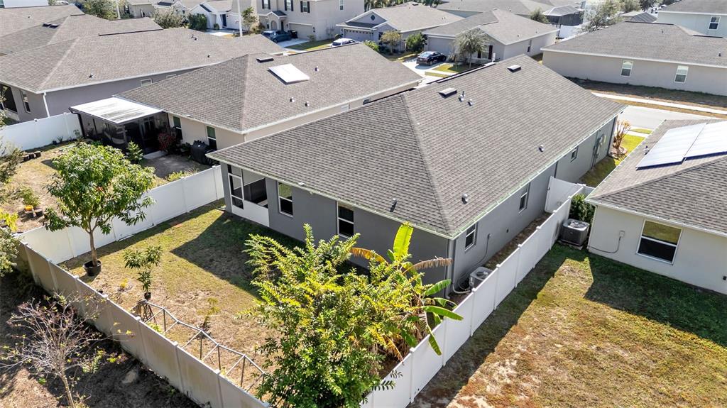 244 Pershing Street Bartow, FL 33830 - Photo 32 of 32 an aerial view of a house with a yard