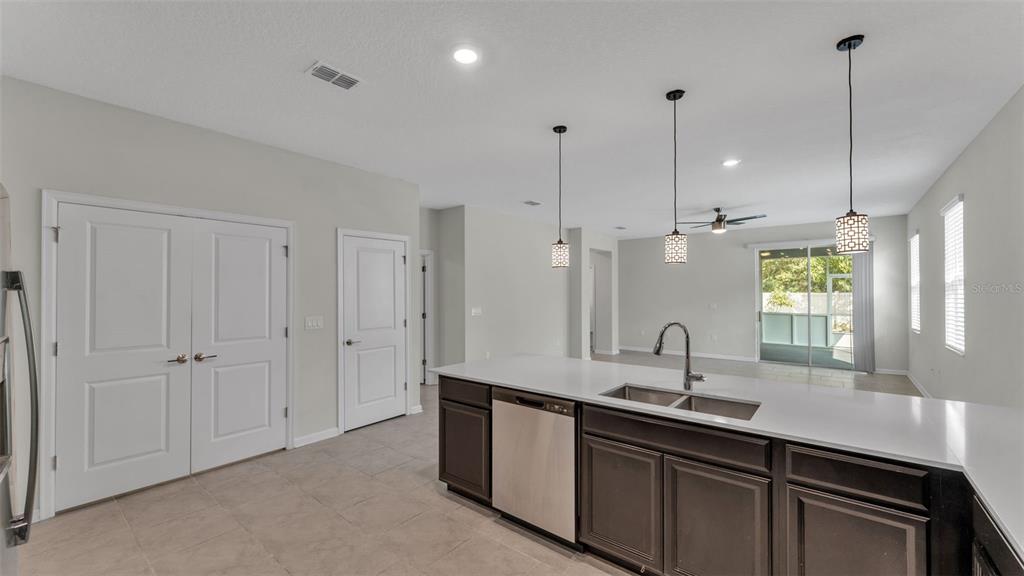 244 Pershing Street Bartow, FL 33830 - Photo 5 of 32 a bathroom with double vanity sinks and a window