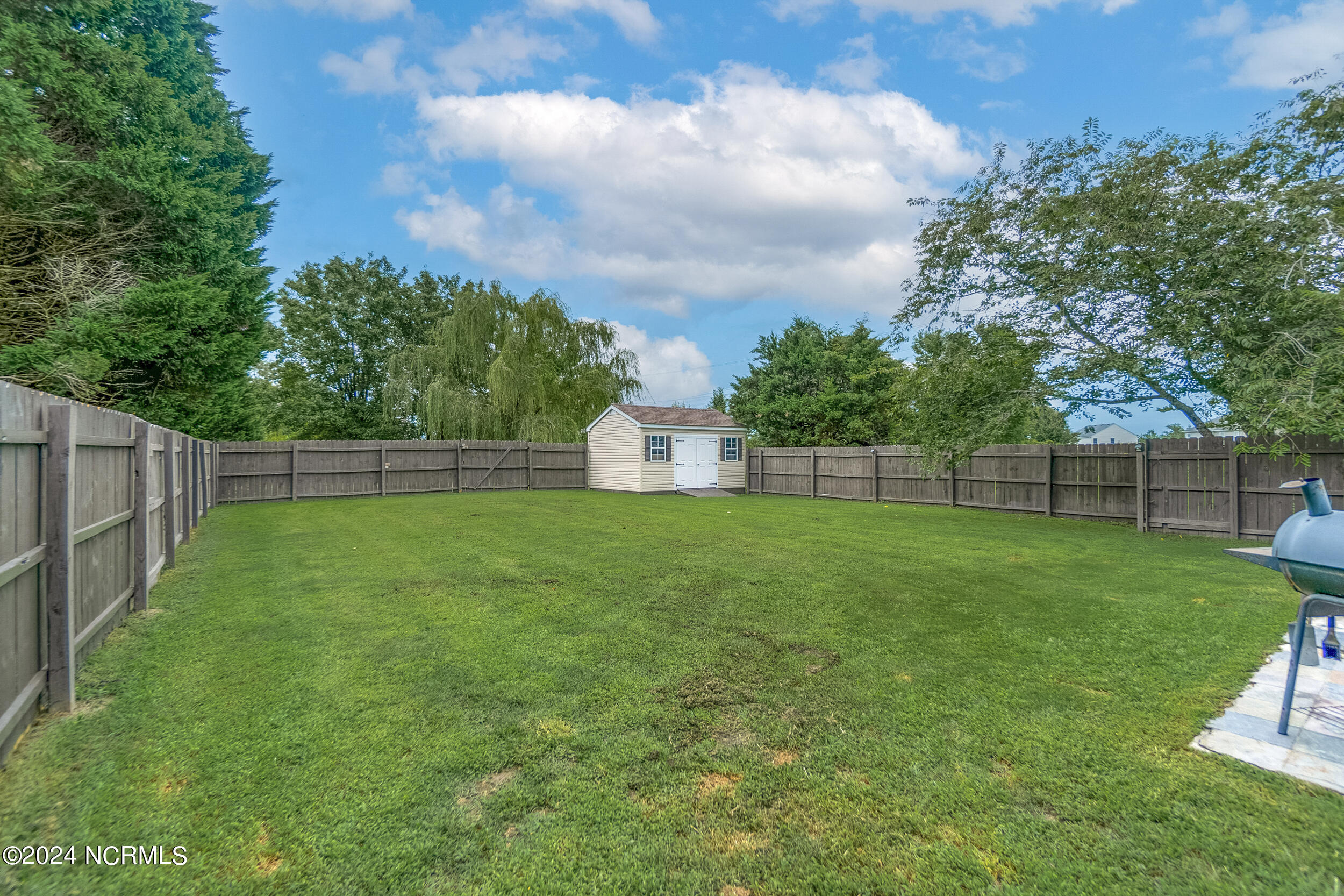 192 Eagle Creek Road Moyock, NC 27958 - Photo 28 of 41 Backyard view from garden