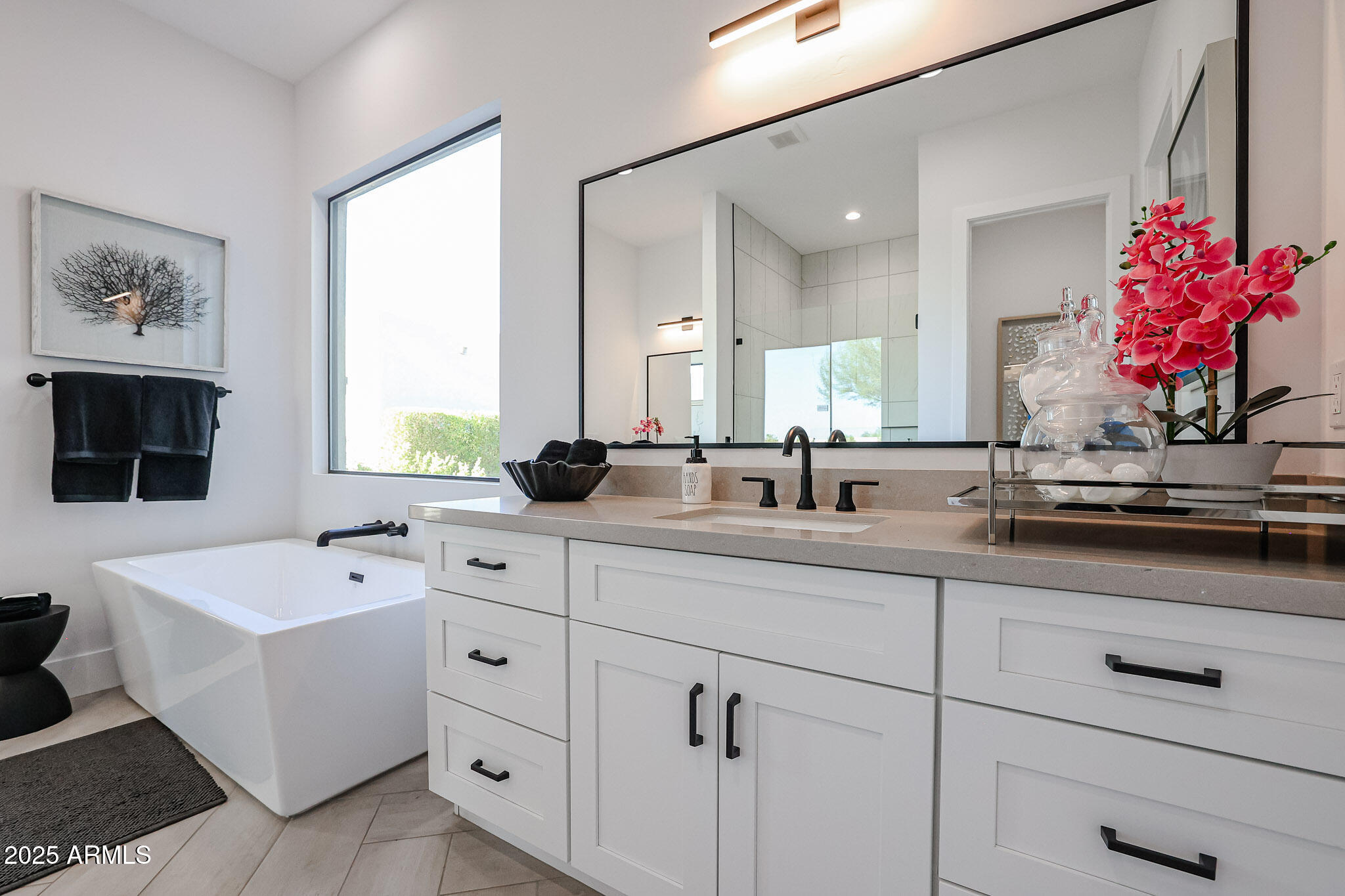 1850 East Creek Canyon Road Phoenix, AZ 85086 - Photo 35 of 92 a bathroom with a sink mirror and window