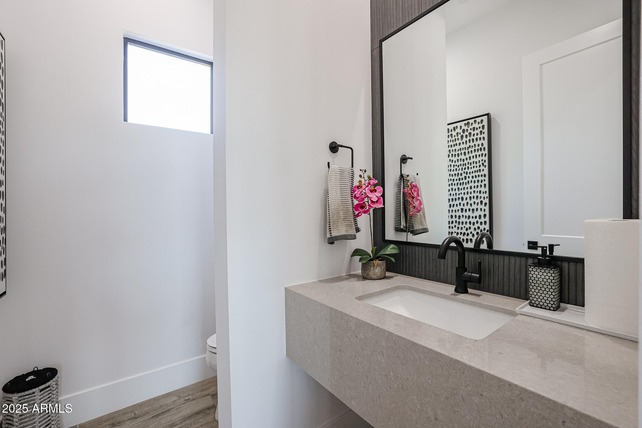 1850 East Creek Canyon Road Phoenix, AZ 85086 - Photo 56 of 92 a bathroom with a sink and a mirror