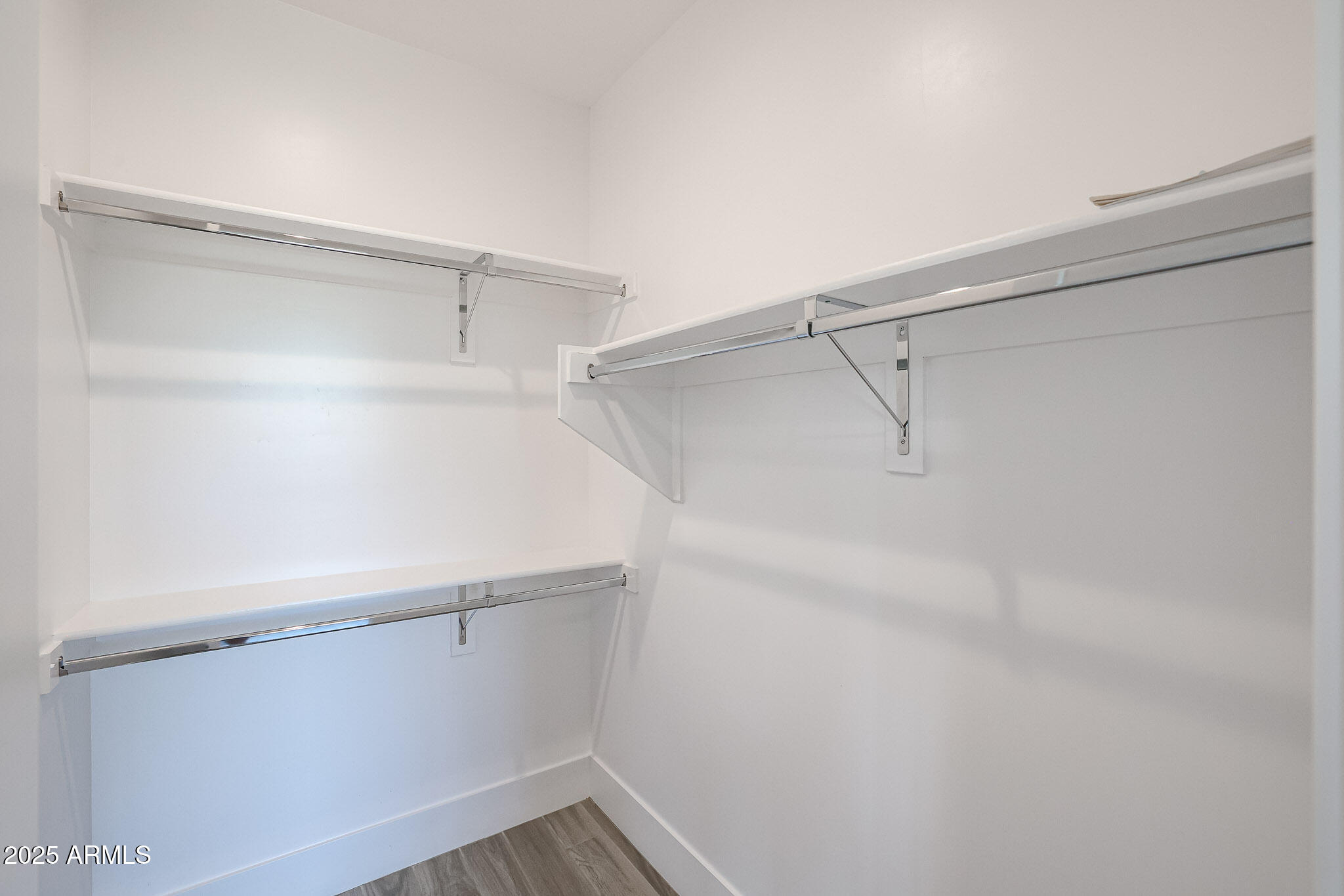 1850 East Creek Canyon Road Phoenix, AZ 85086 - Photo 77 of 92 a view of an empty walk in closet