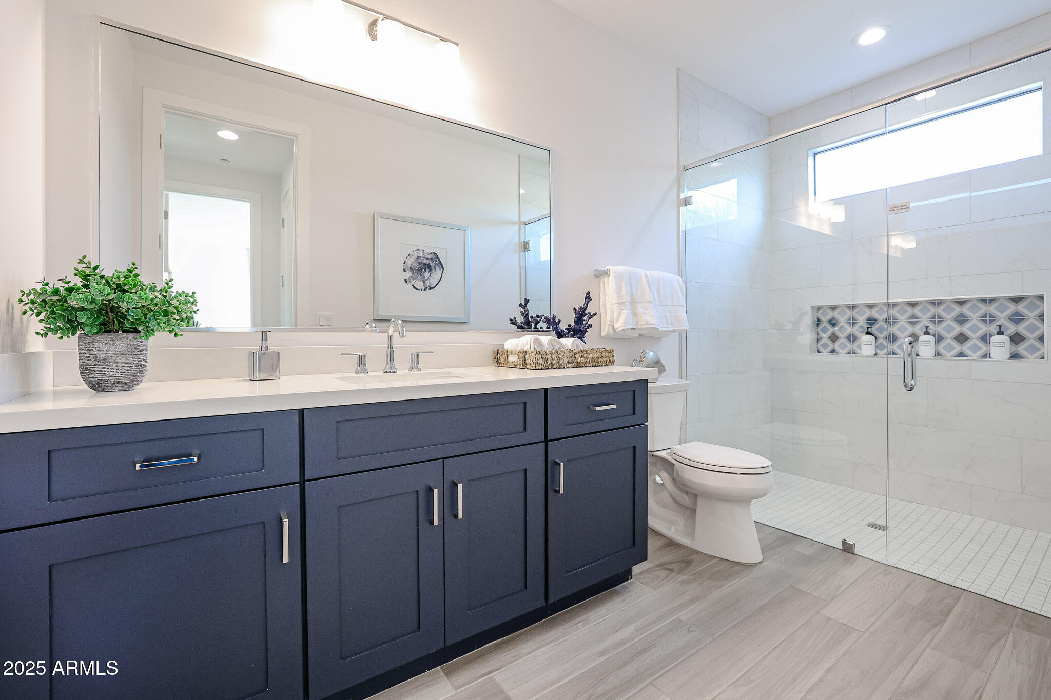 1850 East Creek Canyon Road Phoenix, AZ 85086 - Photo 78 of 92 a bathroom with a toilet sink and mirror