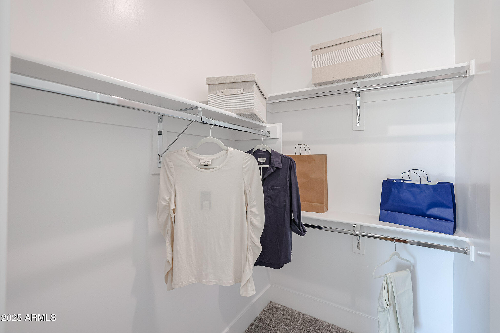 1850 East Creek Canyon Road Phoenix, AZ 85086 - Photo 83 of 92 a view of walk in closet with clothes and shoes