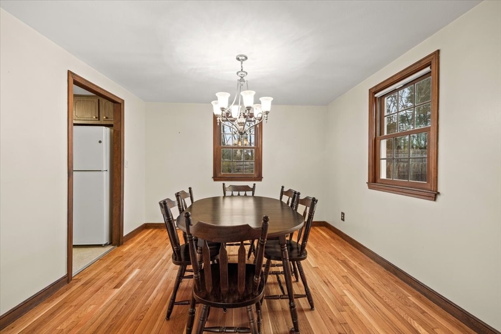 37 Woodlock Road Hingham, MA 02043 - Photo 11 of 34 a view of a dining room with furniture and window
