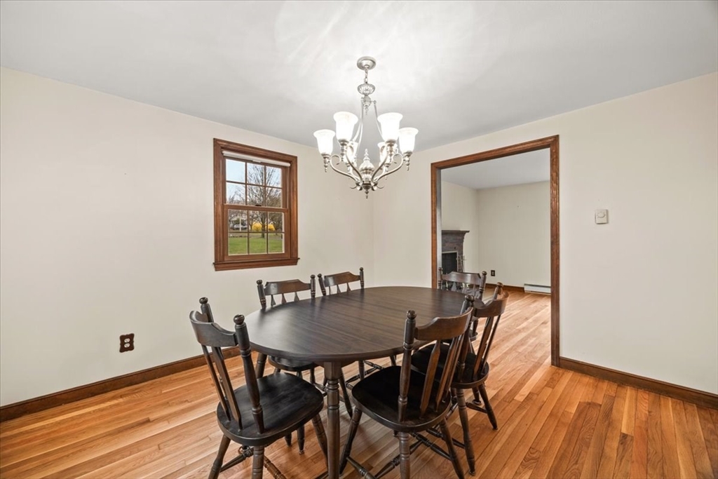 37 Woodlock Road Hingham, MA 02043 - Photo 12 of 34 a view of a dining room with furniture and window