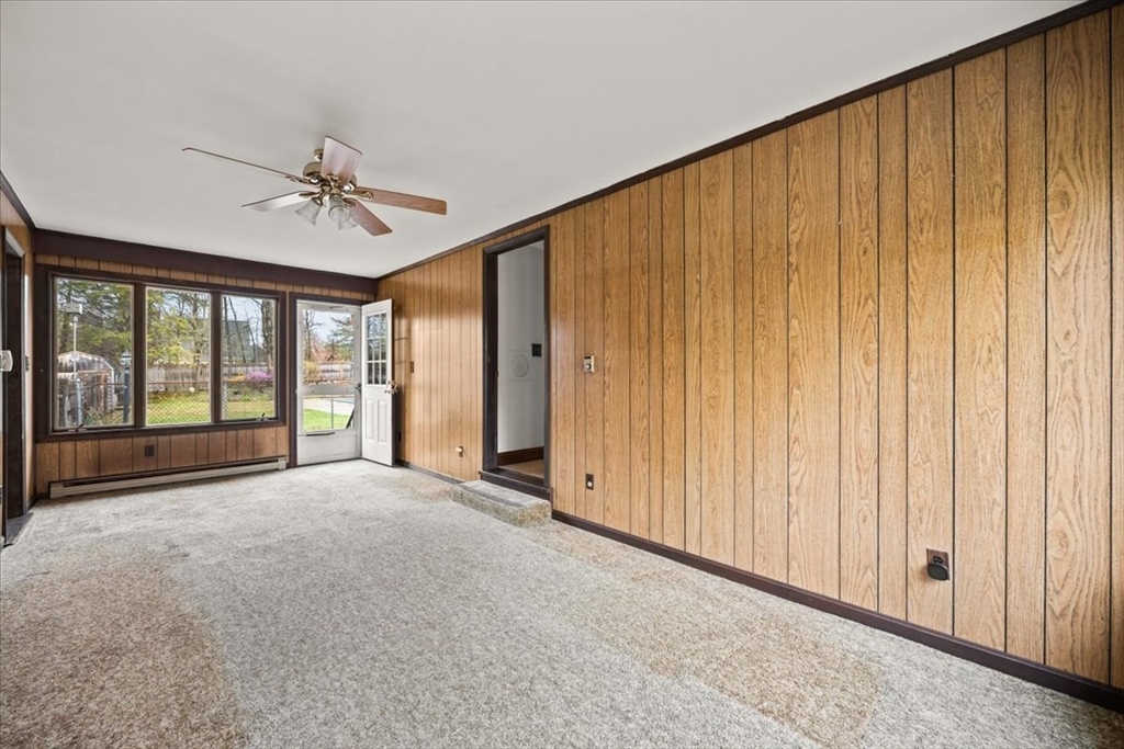 37 Woodlock Road Hingham, MA 02043 - Photo 17 of 34 a view of an empty room with a window