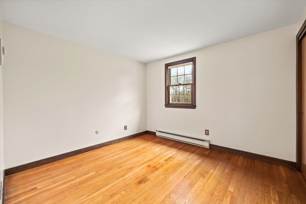 37 Woodlock Road Hingham, MA 02043 - Photo 24 of 34 an empty room with a window
