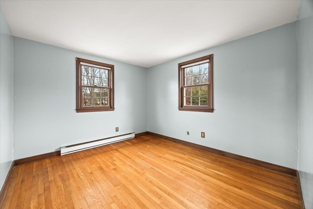 37 Woodlock Road Hingham, MA 02043 - Photo 27 of 34 a view of a room with blue walls