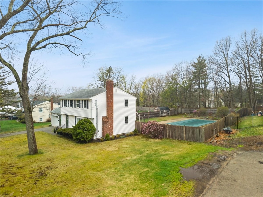 37 Woodlock Road Hingham, MA 02043 - Photo 3 of 34 a view of a house with a yard