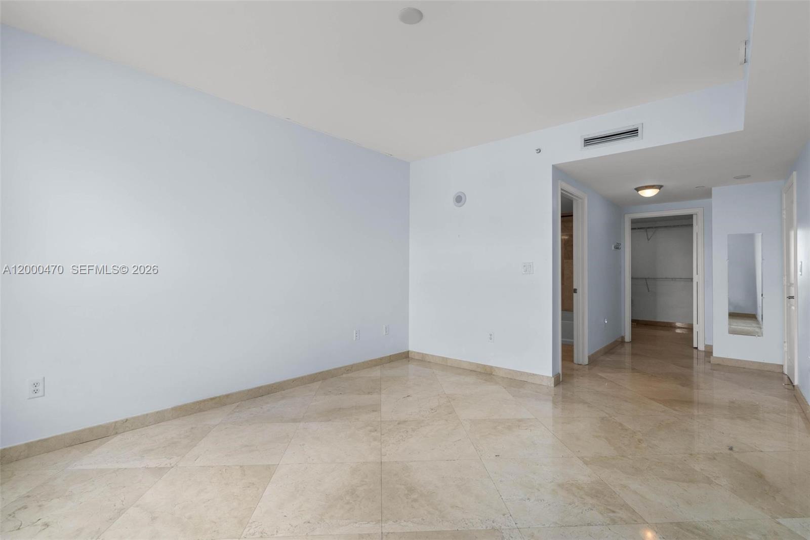 7350 Southwest 89th Street, Unit 1707S Miami, FL 33156 - Photo 12 of 45 an empty room with an entryway