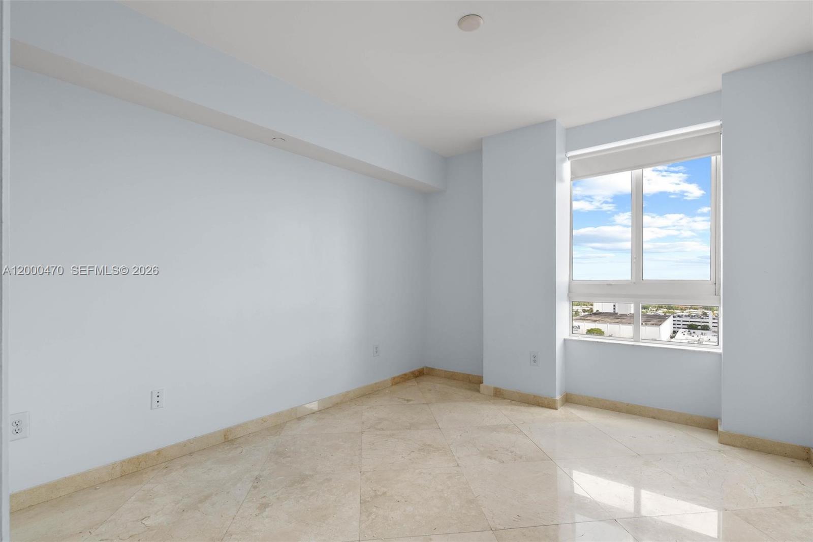 7350 Southwest 89th Street, Unit 1707S Miami, FL 33156 - Photo 17 of 45 an empty room with windows