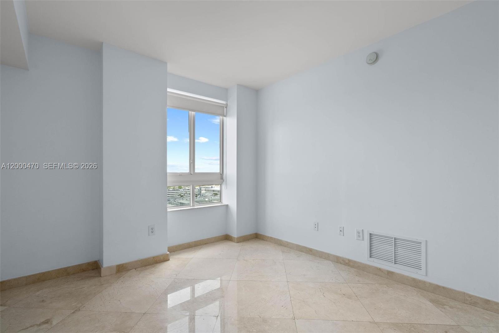 7350 Southwest 89th Street, Unit 1707S Miami, FL 33156 - Photo 20 of 45 a view of an empty room and window