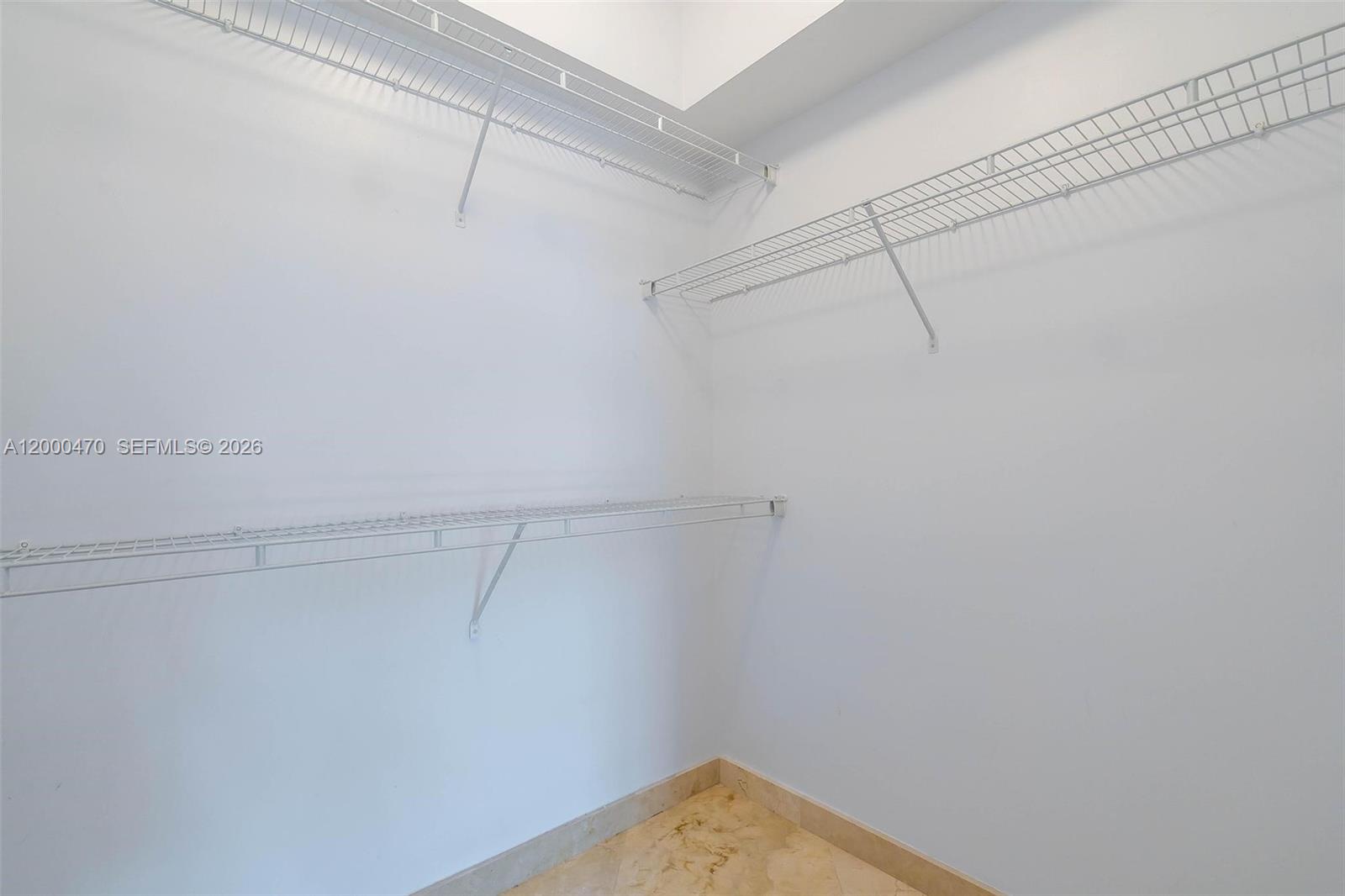7350 Southwest 89th Street, Unit 1707S Miami, FL 33156 - Photo 22 of 45 a view of a room with racks on the wall