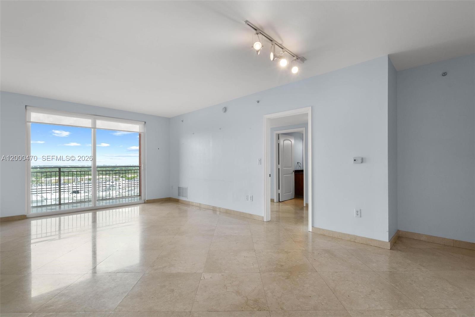 7350 Southwest 89th Street, Unit 1707S Miami, FL 33156 - Photo 24 of 45 wooden floor in an empty room with a window