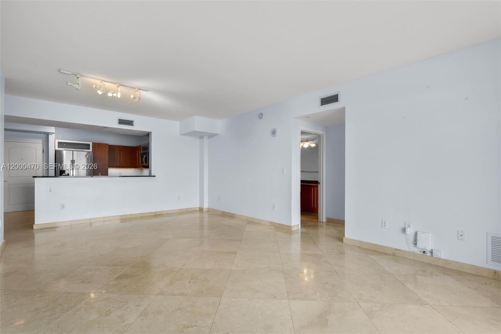 7350 Southwest 89th Street, Unit 1707S Miami, FL 33156 - Photo 28 of 45 a view of a livingroom with an empty space