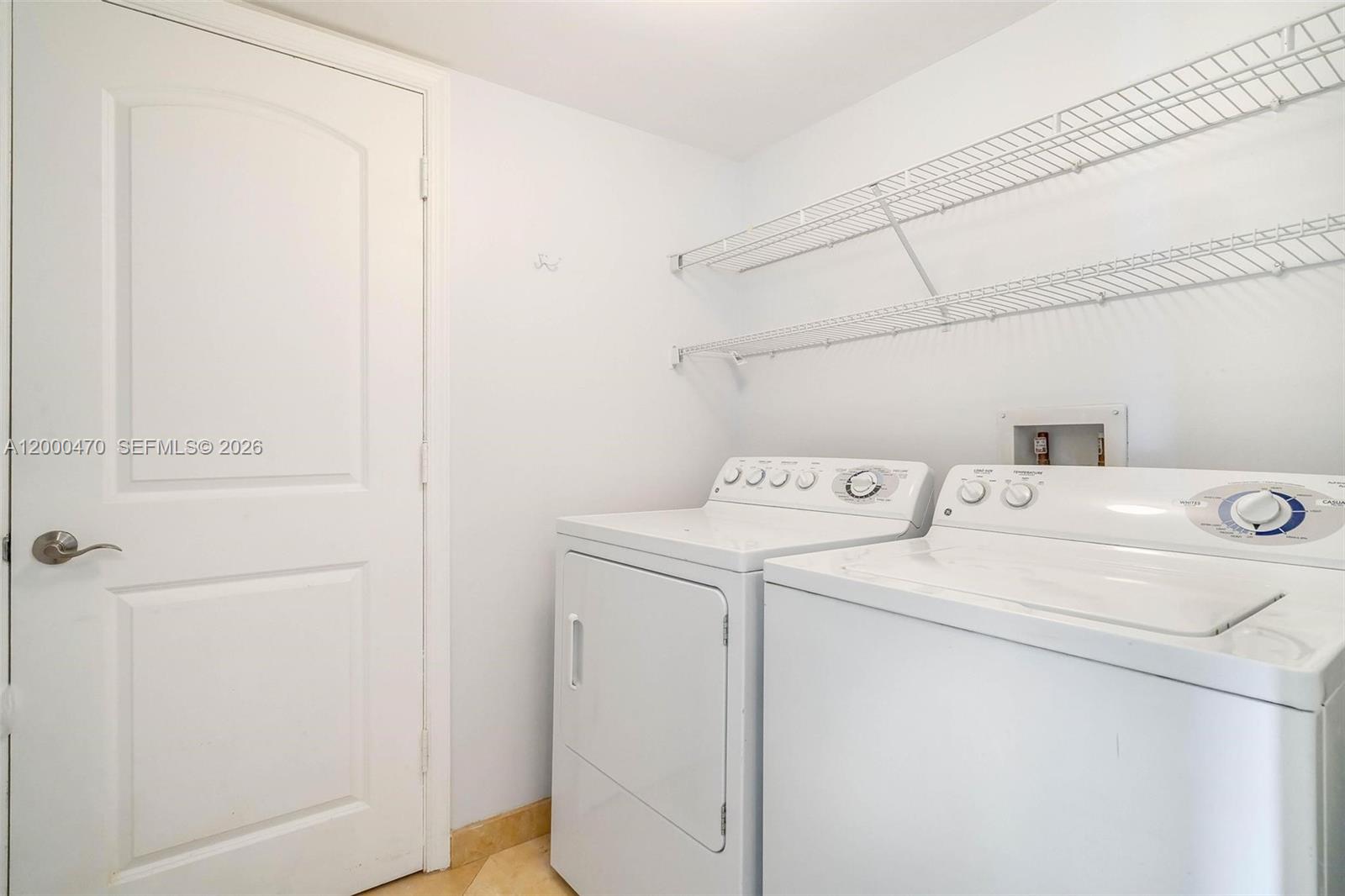 7350 Southwest 89th Street, Unit 1707S Miami, FL 33156 - Photo 41 of 45 a utility room with dryer and washer