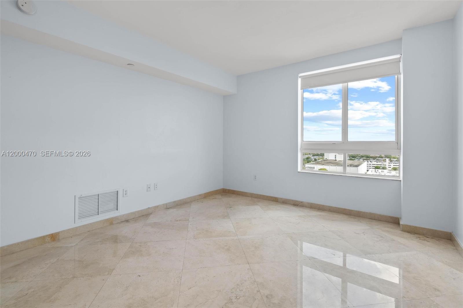 7350 Southwest 89th Street, Unit 1707S Miami, FL 33156 - Photo 10 of 45 an empty room with a window