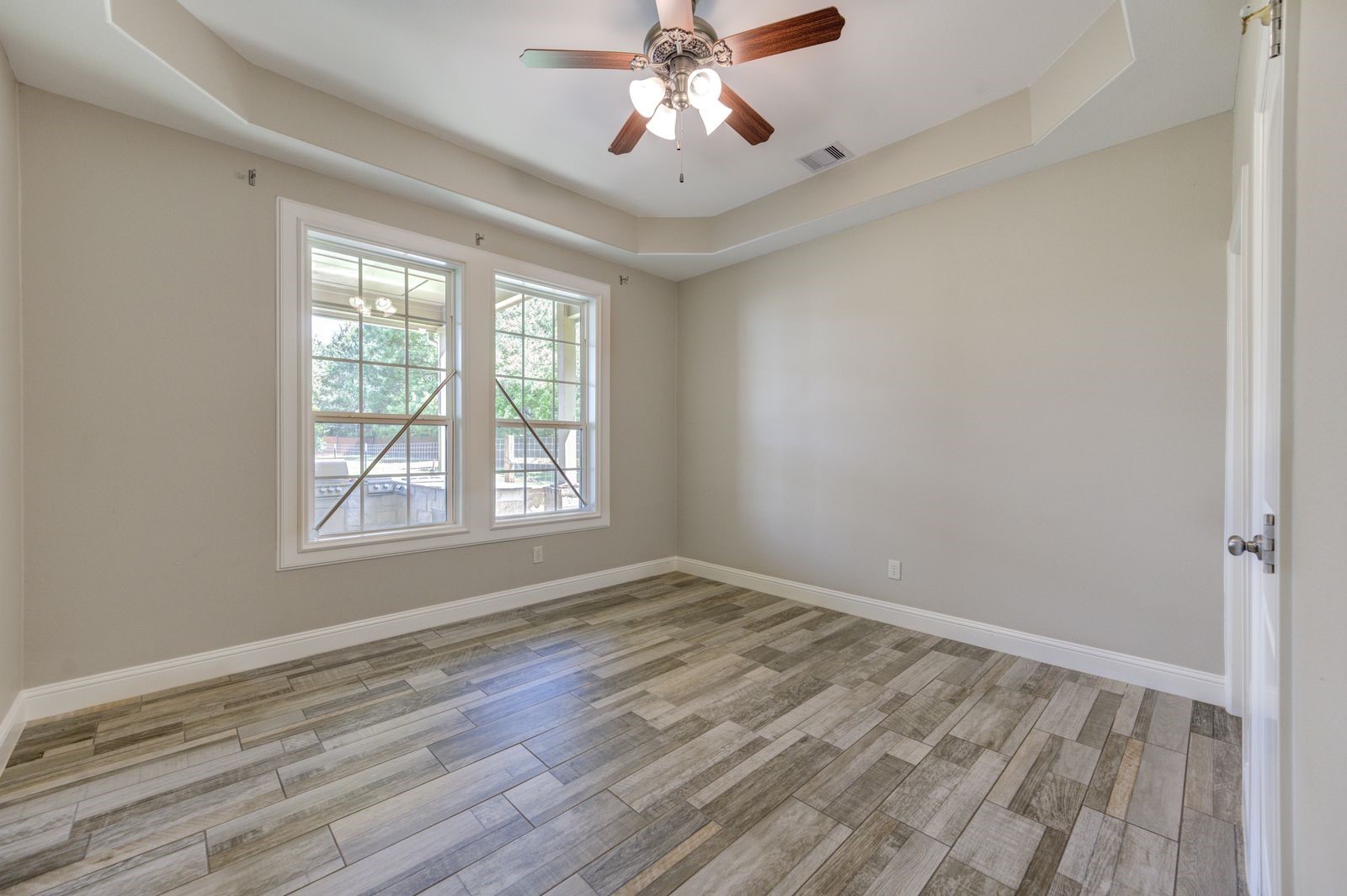 21038 Angus Drive Cleveland, TX 77328 - Photo 21 of 49 wooden floor in an empty room with a window