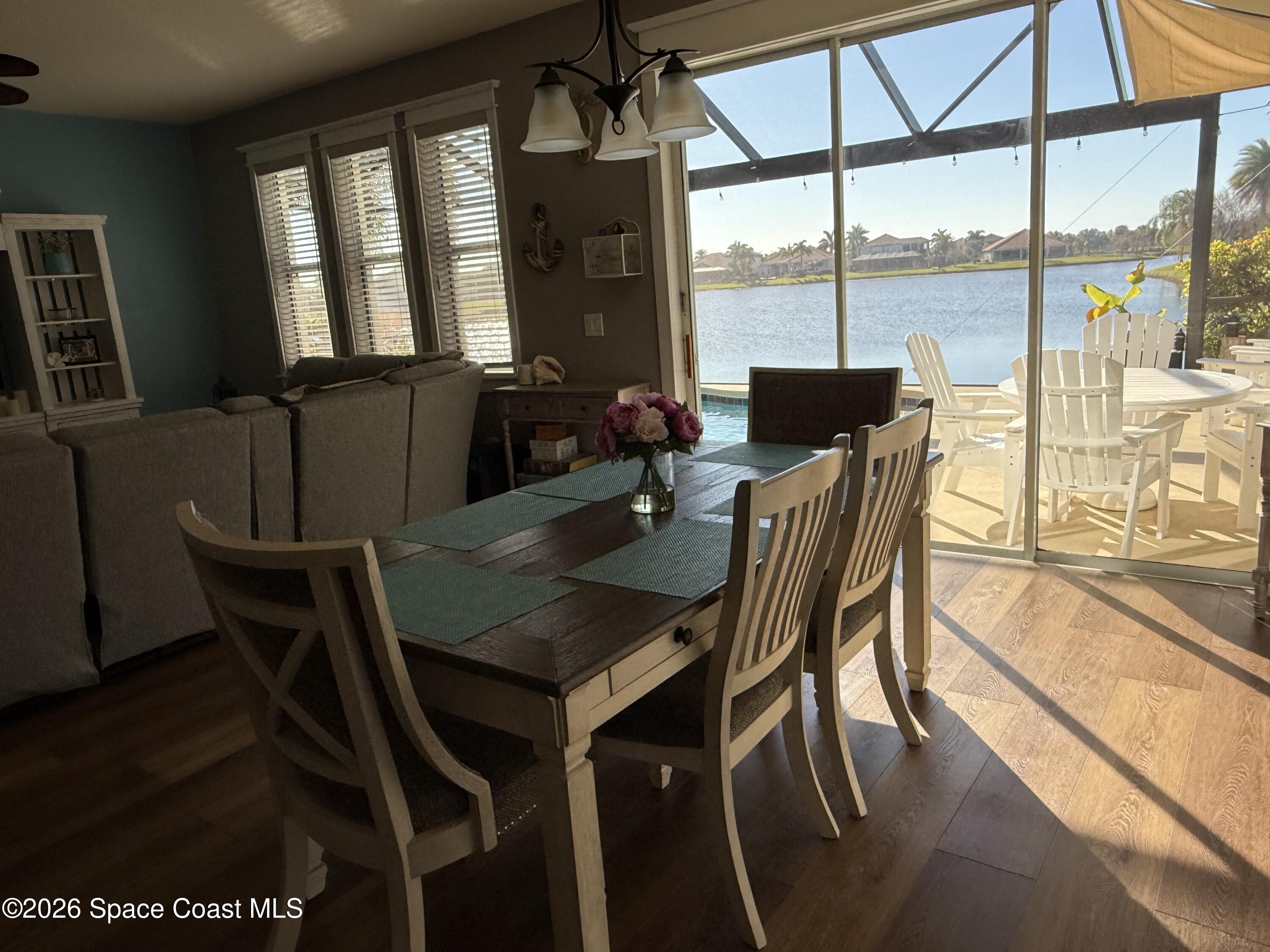 3283 Candia Drive Melbourne, FL 32940 - Photo 6 of 13 Dining area overlooking the lake