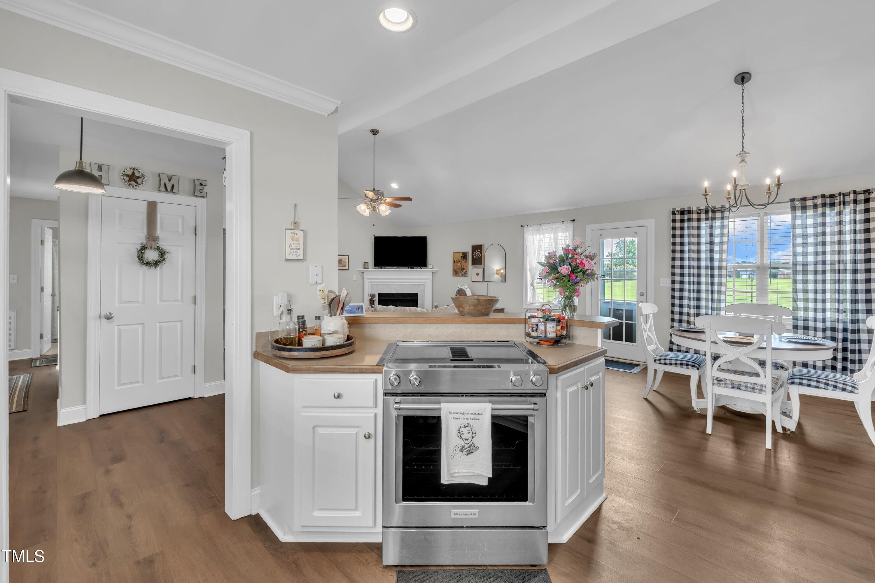 6953 Rock Ridge Sims Road Sims, NC 27880 - Photo 12 of 29 a kitchen with stainless steel appliances granite countertop a stove and cabinets