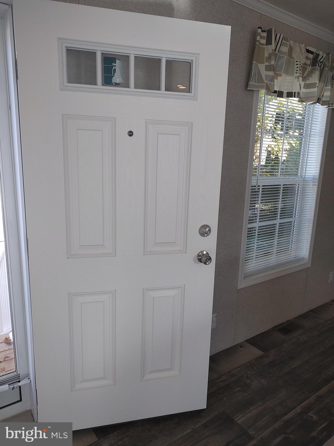 12623 Shell Mill Road, Unit 51 Bishopville, MD 21813 - Photo 13 of 41 a view of front door