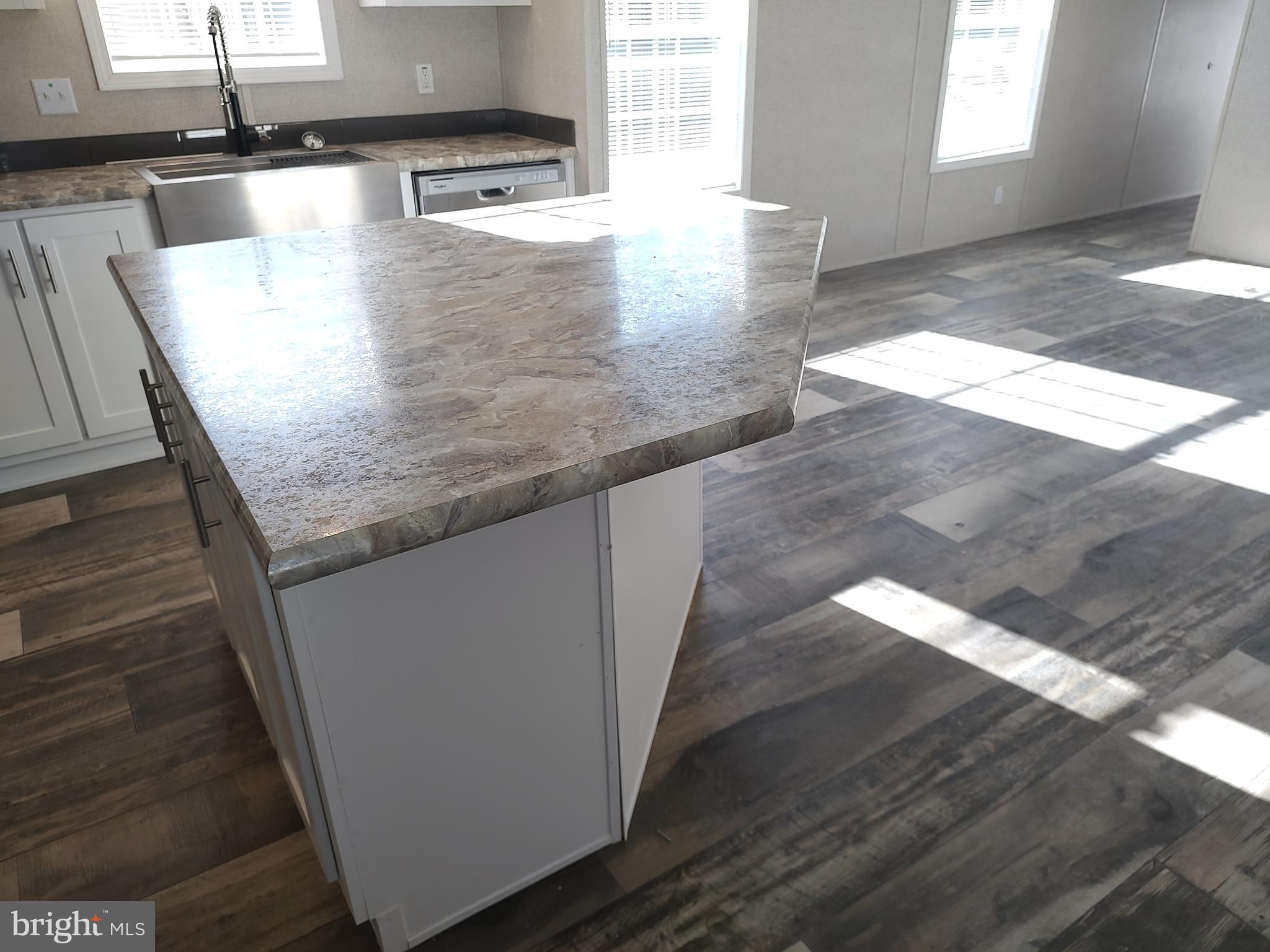 12623 Shell Mill Road, Unit 51 Bishopville, MD 21813 - Photo 24 of 41 a view closeup of a kitchen counter top
