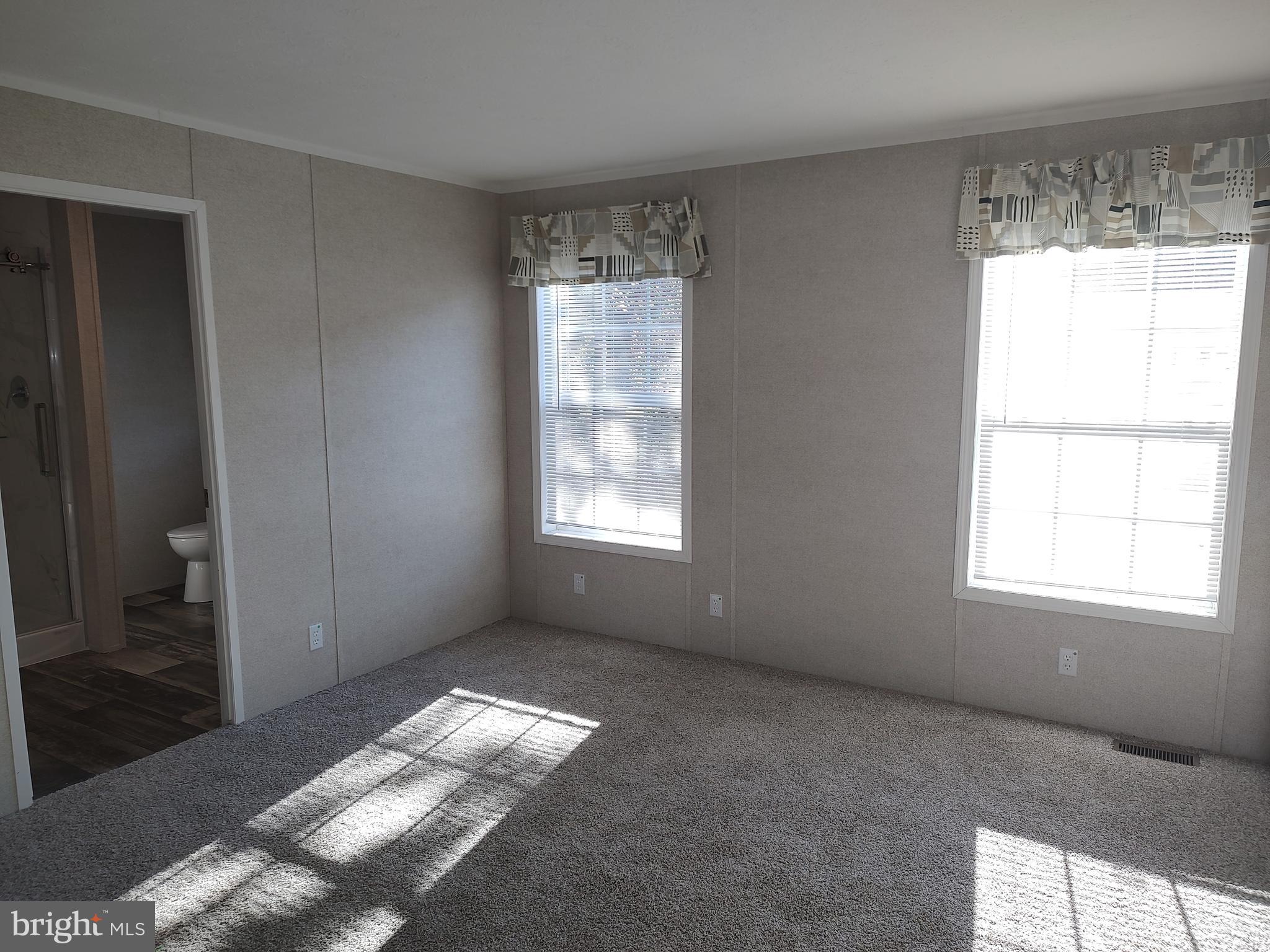 12623 Shell Mill Road, Unit 51 Bishopville, MD 21813 - Photo 25 of 41 a view of livingroom with window