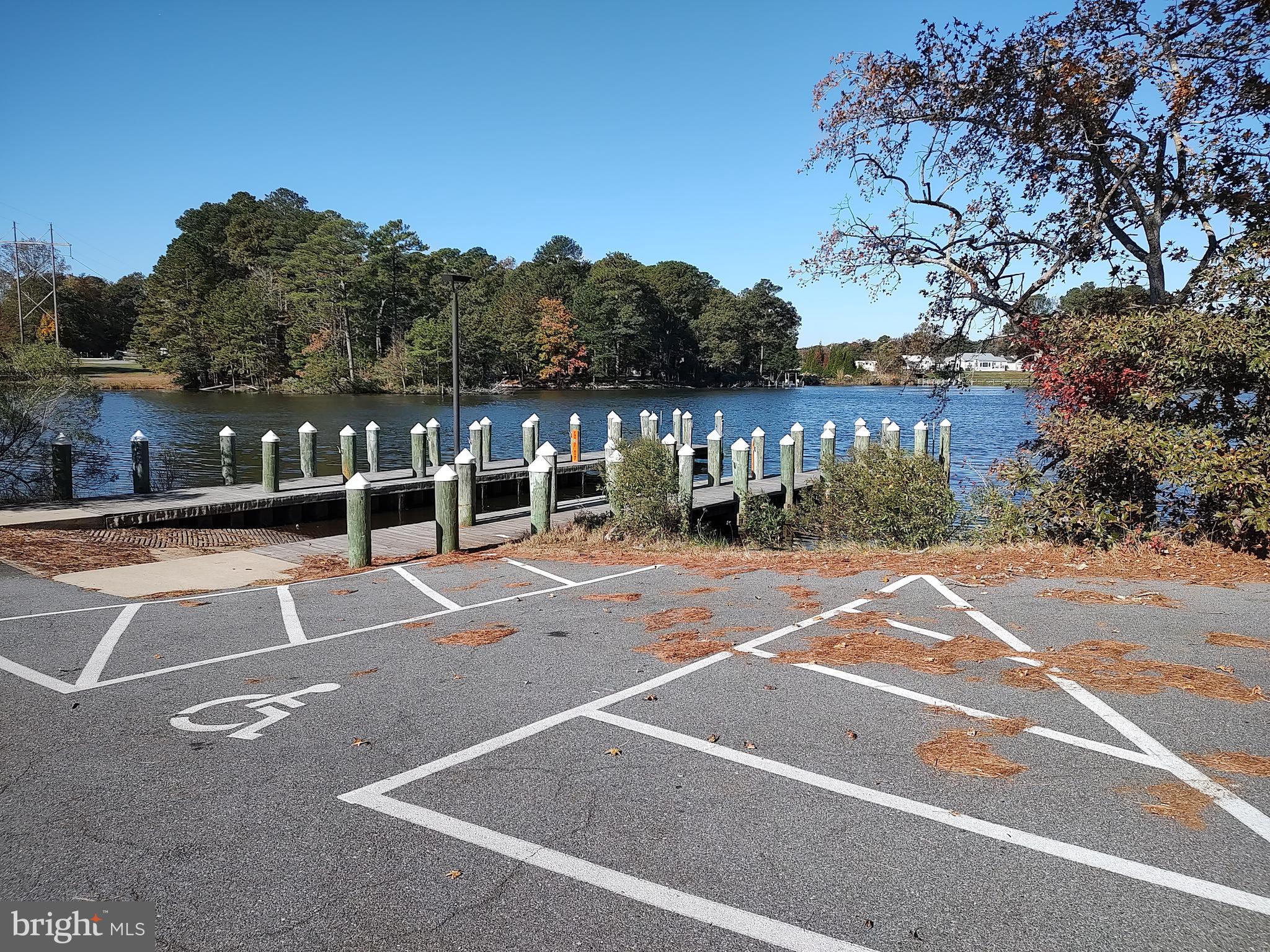 12623 Shell Mill Road, Unit 51 Bishopville, MD 21813 - Photo 3 of 41 a view of a tennis court