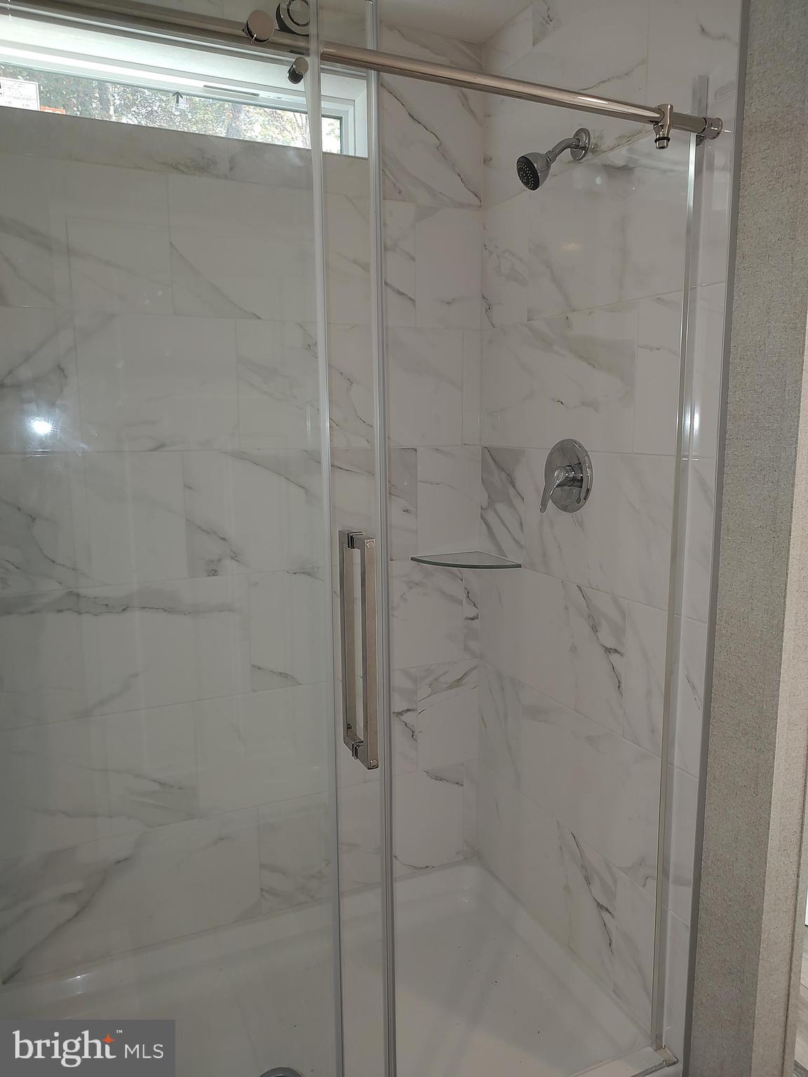 12623 Shell Mill Road, Unit 51 Bishopville, MD 21813 - Photo 31 of 41 a bathroom with a shower