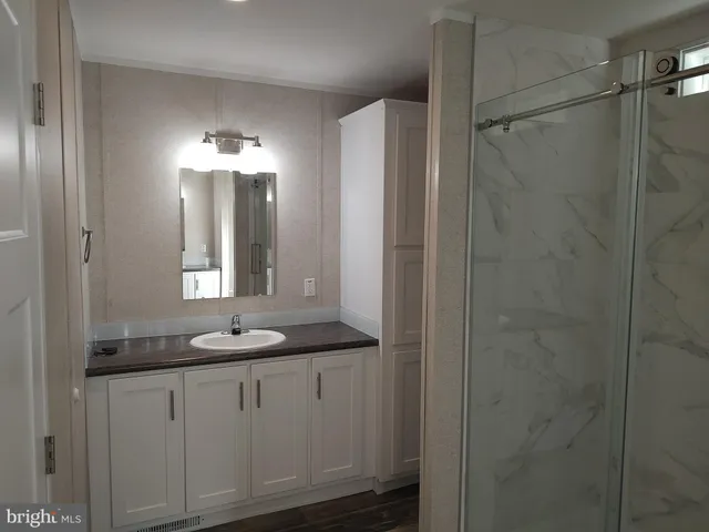 a view of storage and utility room with empty racks