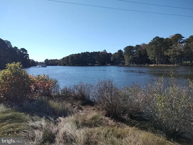 a view of mountain with lake view
