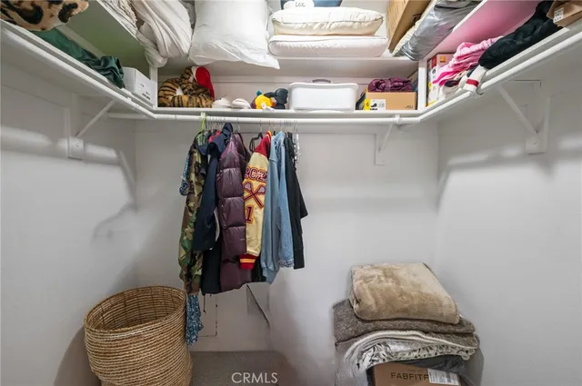 a view of a living room and kitchen