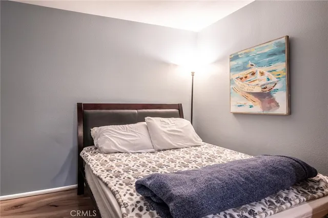 a kitchen with a table chairs stove and cabinets
