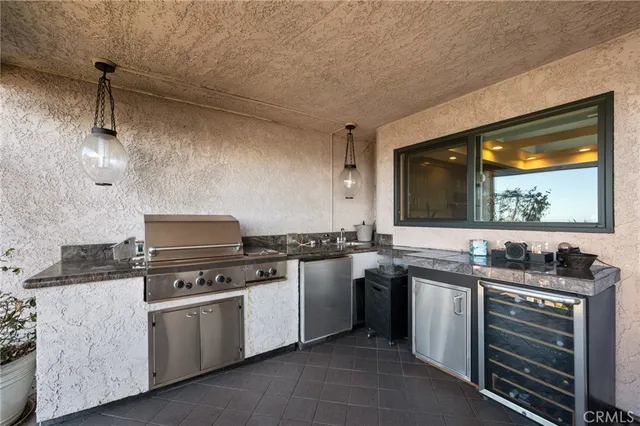 a dining room with furniture and a flat screen tv