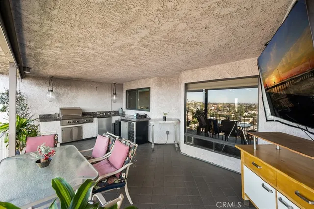 a view of a building with potted plants