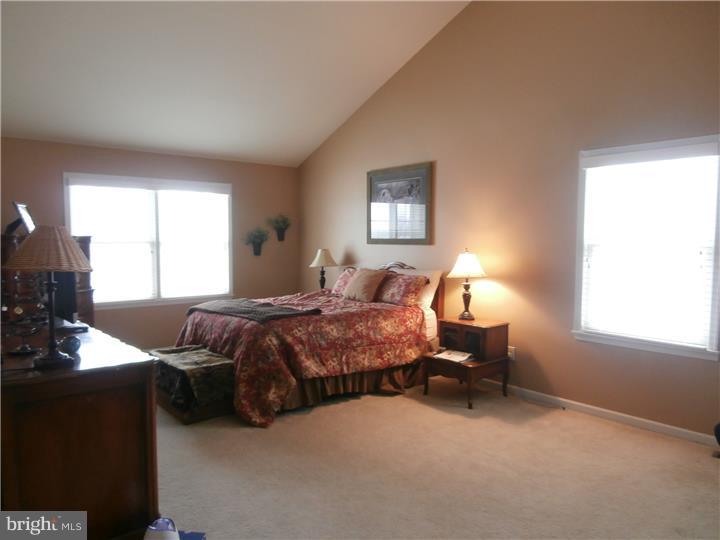 90 Willow Grove Road Shamong, NJ 08088 - Photo 14 of 17 a bedroom with a bed and a window