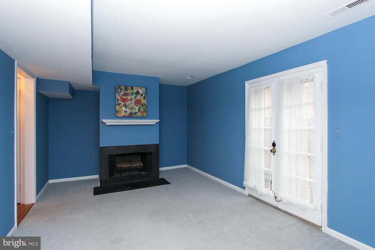 6720 Hillandale Road, Unit 15 Chevy Chase, MD 20815 - Photo 11 of 26 Living Room w/French Doors to Deck!