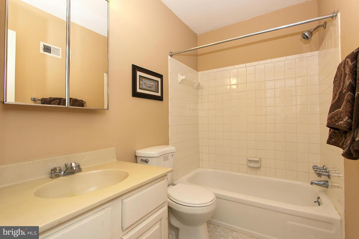 6720 Hillandale Road, Unit 15 Chevy Chase, MD 20815 - Photo 23 of 26 Hall bath