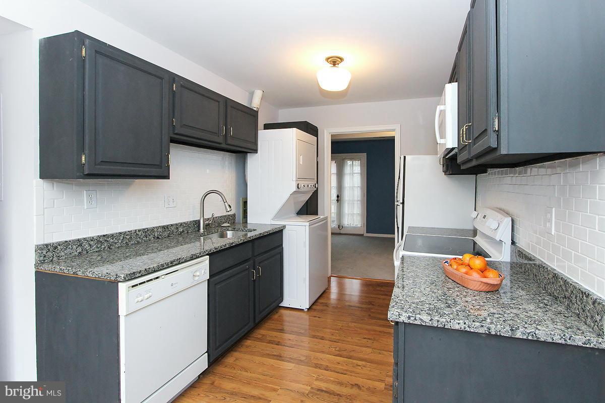 6720 Hillandale Road, Unit 15 Chevy Chase, MD 20815 - Photo 4 of 26 Kitchen w/table space opens to Living Room