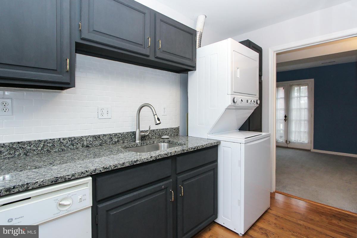 6720 Hillandale Road, Unit 15 Chevy Chase, MD 20815 - Photo 5 of 26 Kitchen includes a stacked W/D