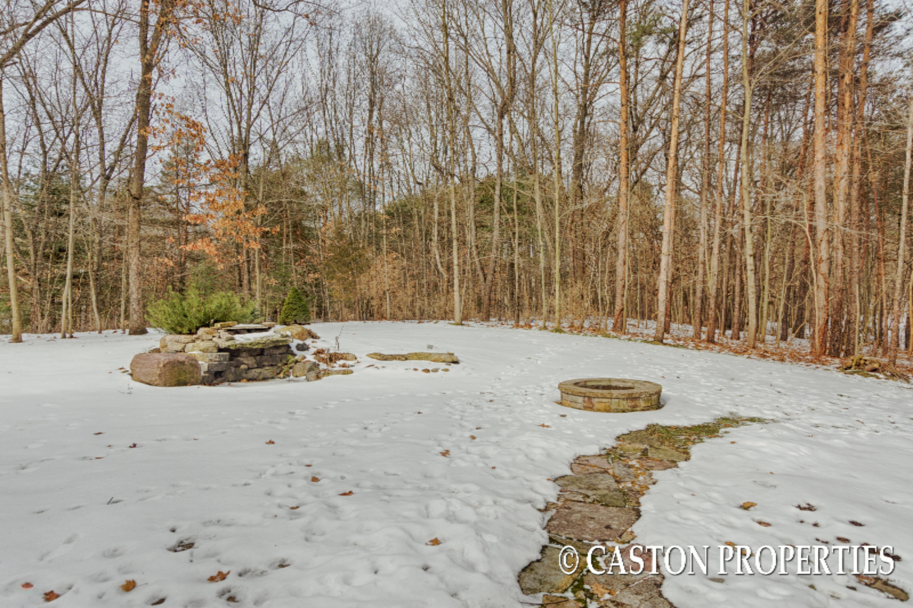 7699 Cascade Road Southeast Grand Rapids, MI 49546 - Photo 46 of 62 47 Back Yard