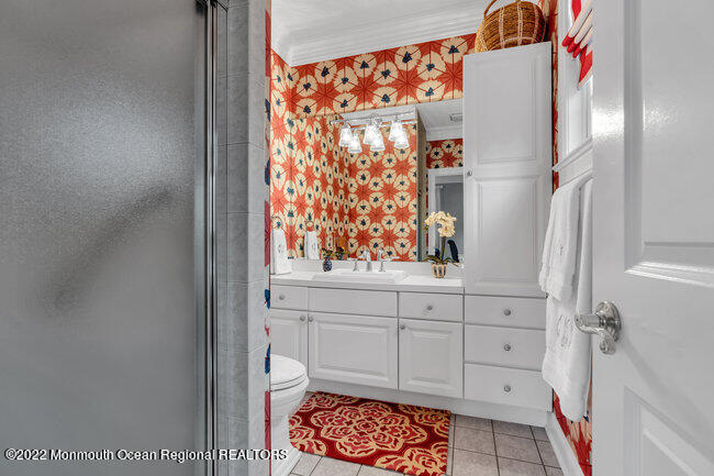 312 Essex Avenue Spring Lake, NJ 07762 - Photo 16 of 29 a bathroom with a bathtub and a shower